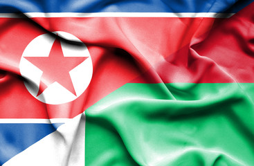 Waving flag of Madagascar and North Korea