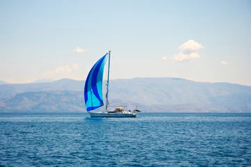 Foto op Canvas Sailing boat and coastline © ancymonek