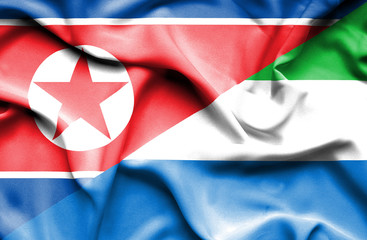 Waving flag of Sierra Leone and North Korea