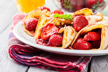 Traditional crepes served with strawberries