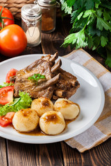 Pork spareribs served with silesian noodles and sauce