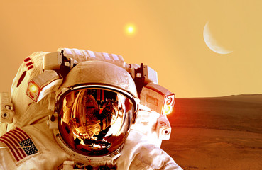 Astronaut spaceman helmet space planet Mars apocalypse moon. Elements of this image furnished by NASA. © nikonomad