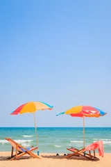 Zelfklevend Fotobehang Beach chair and umbrella on sand beach © thawornnurak