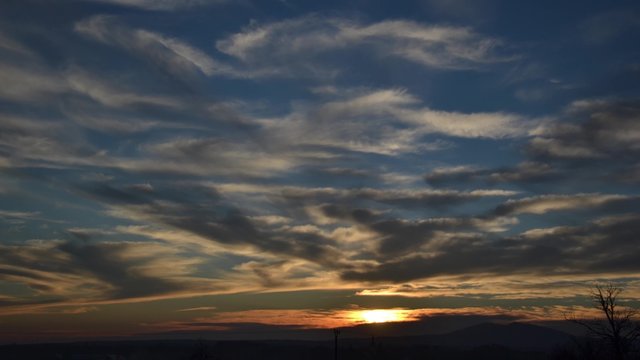 Sunset over the village time lapse