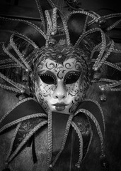 red carnival mask, black and white image