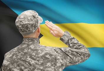 Soldier in hat facing national flag series - Bahamas