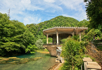 Fototapeta premium Pavilion at blue lake and mountain