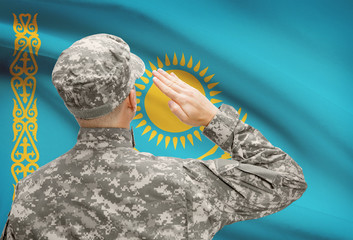 Soldier in hat facing national flag series - Kazakhstan