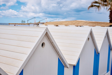 Fototapeta na wymiar The beach huts on coast of Terracina, Italy