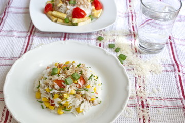 vegetable risotto served on chequered tablecloth