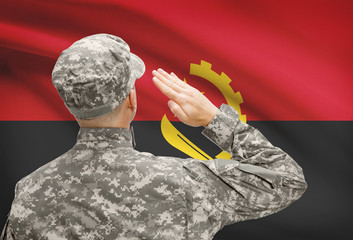 Soldier in hat facing national flag series - Angola