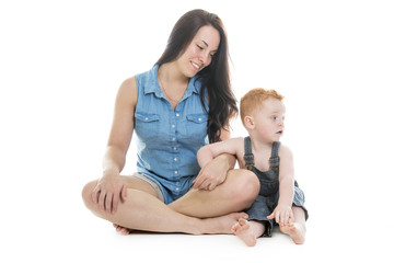 baby boy with his mother over a isolated white background