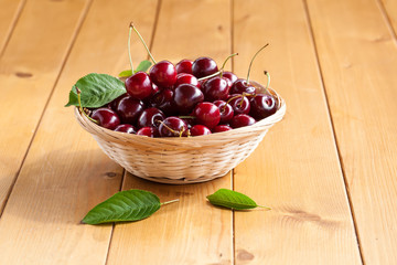 Cherries on wooden table