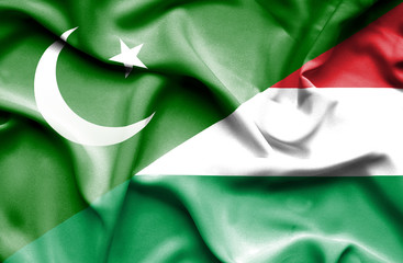 Waving flag of Hungary and Pakistan