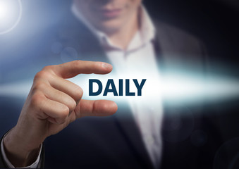 Businessman presses button daily on virtual screens. Business, technology, internet and networking concept.