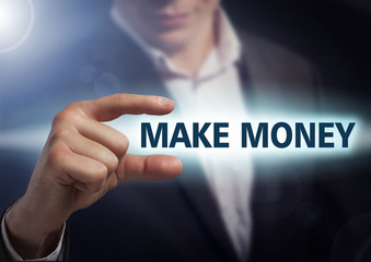 Businessman presses button make money on virtual screens. Busine