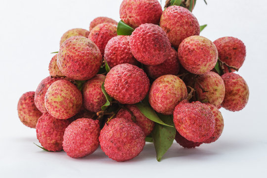 Fresh lychees bunch on white background