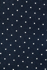 Navy blue box weave cotton fabric with white dots, full frame