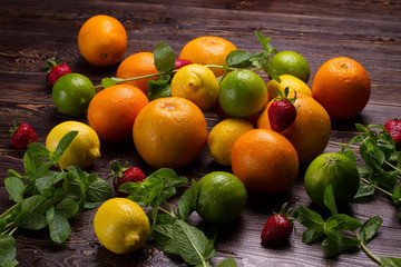 Different  fruits, strawberries and fresh mint.