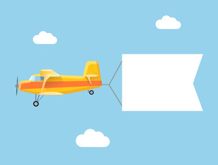 The plane flies with long banners for your text on a background © lightgirl
