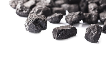 Pile of coal isolated on white background