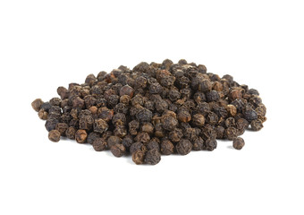 Whole black pepper, isolated on white. Shallow depth of field, f