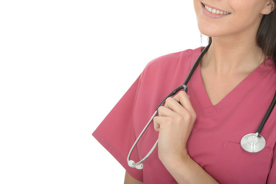 Beautiful Happy Smiling Young Female Doctor Wearing Pink Theatre Scrubs