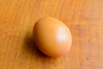 Eggs on wooden table background