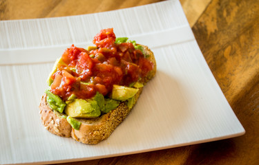 avocado toast with salsa topping 