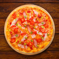 Delicious pizza with red and green hot chili peppers