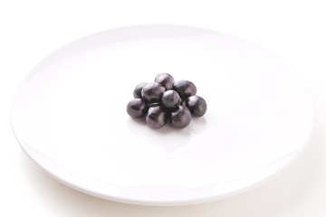 Blueberry on White Plate Isolated on White Background.
