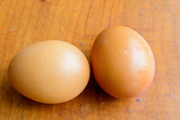 Eggs on wooden table background
