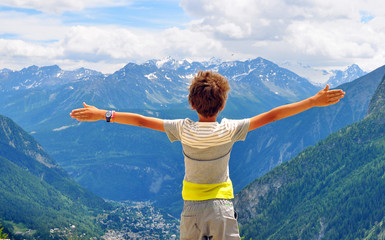 Boy hugging the world