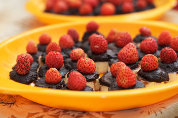 Strawberries with chocolate and a banana