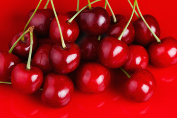 Cherry on a Red Dish