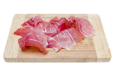 Ham on cutting board on white background