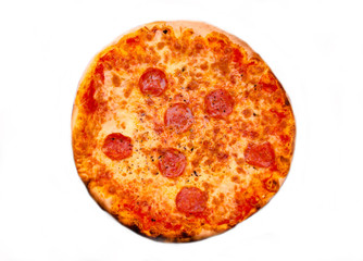 Round pizza with salami on white background top view