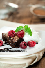 Chocolate cake with raspberry and mint
