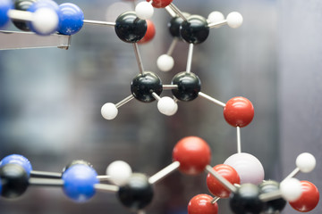 Molecular, DNA and atom model in science research lab