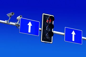 Traffic lights over blue sky