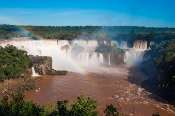Rainbow over gorgeous waterfalls of Iguazu, Brazil