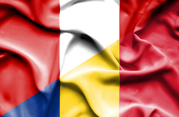 Waving flag of Romania and Peru