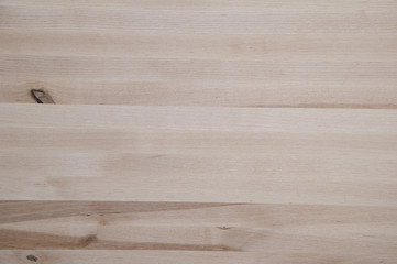 Wooden board laminated out of spruce