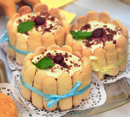 savoiardi cake topped with cherry