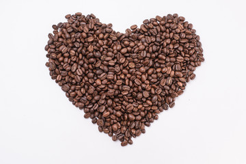 Coffee beans in shape of heart.