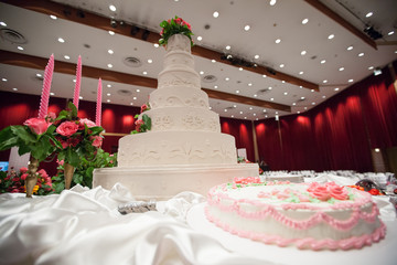 Beautiful Cake decorate with pink rose  for Wedding Ceremony