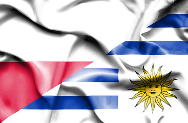 Obraz premium Waving flag of Uruguay and Poland
