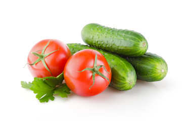 Fresh Tomatoes, Cucumbers and Parsley isolated on white background