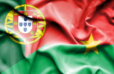 Waving flag of Burkina Faso and Portugal