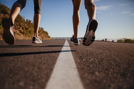 Runners running on the road